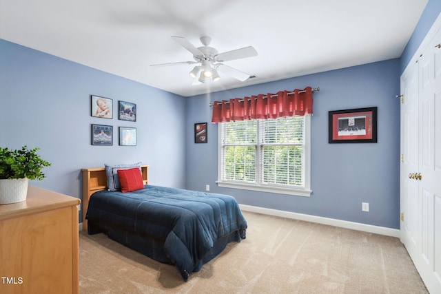 315 Birdwood Ct, Cary, NC 27519 - bedroom with light colored carpet and a ceiling fan