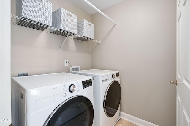 315 Birdwood Ct, Cary, NC 27519 - laundry room featuring washer and clothes dryer and light tile patterned flooring
