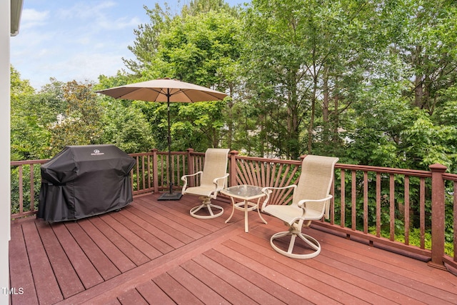 315 Birdwood Ct, Cary, NC 27519 - wooden deck featuring grilling area and view of wooded area