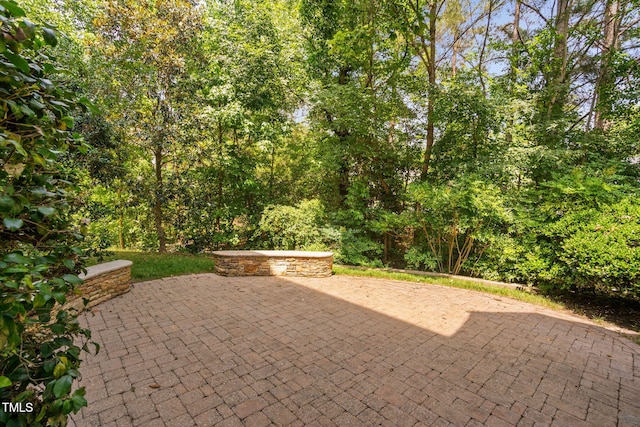 315 Birdwood Ct, Cary, NC 27519 - view of patio / terrace with a wooded view