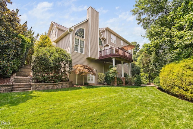 315 Birdwood Ct, Cary, NC 27519 - rear view of house with a chimney, a yard, stairway, and french doors