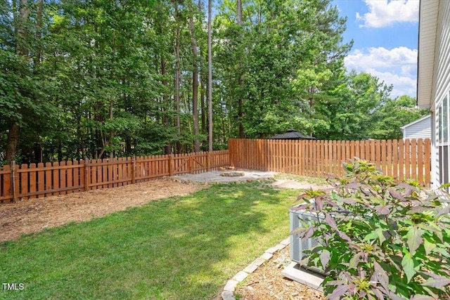 1016 Goldmist Ln, Durham, NC 27713 - fenced backyard with a fire pit