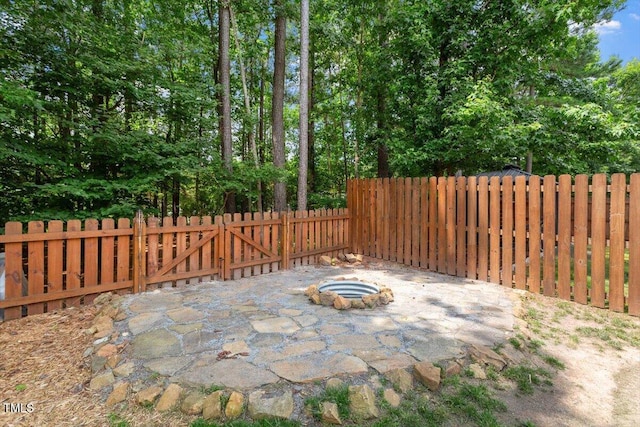 1016 Goldmist Ln, Durham, NC 27713 - view of patio / terrace featuring a fire pit