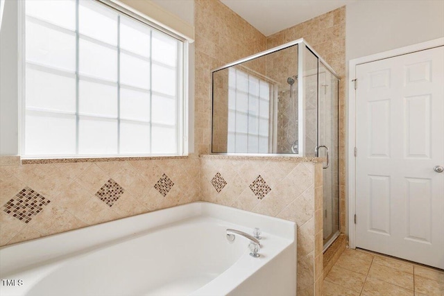 1016 Goldmist Ln, Durham, NC 27713 - full bath with a garden tub, a shower stall, and tile patterned flooring