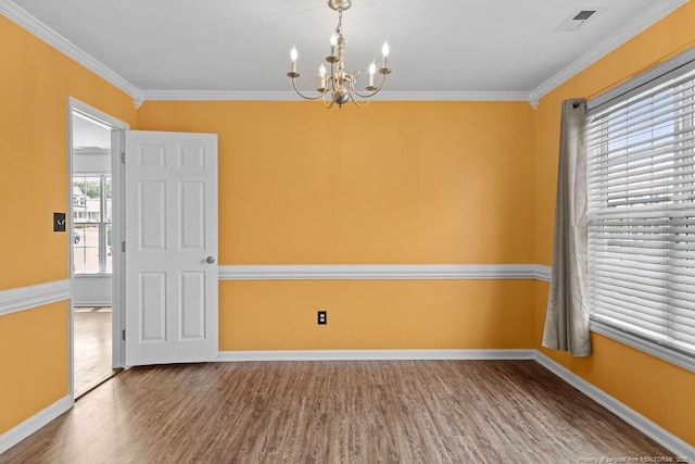 3118 High Plains Dr, Hope Mills, NC 28348 - unfurnished room with wood finished floors, a chandelier, and ornamental molding