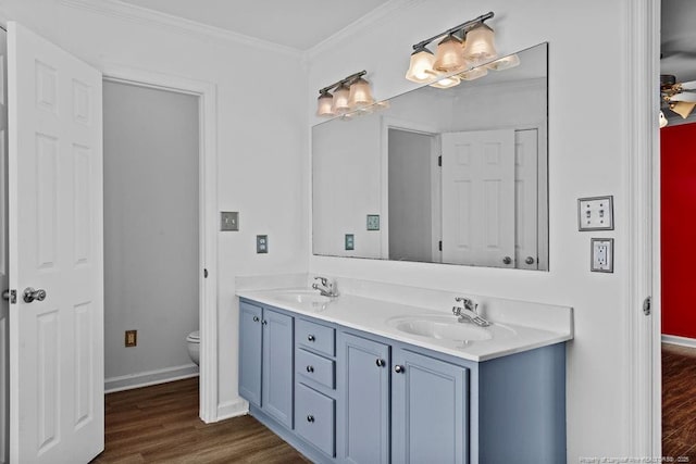 3118 High Plains Dr, Hope Mills, NC 28348 - full bath featuring double vanity, wood finished floors, and ornamental molding