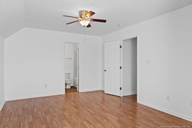 3118 High Plains Dr, Hope Mills, NC 28348 - unfurnished bedroom with light wood-style floors, connected bathroom, and ceiling fan