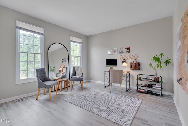 5308 Bentgrass Dr, Raleigh, NC 27610 - living area with wood finished floors and baseboards