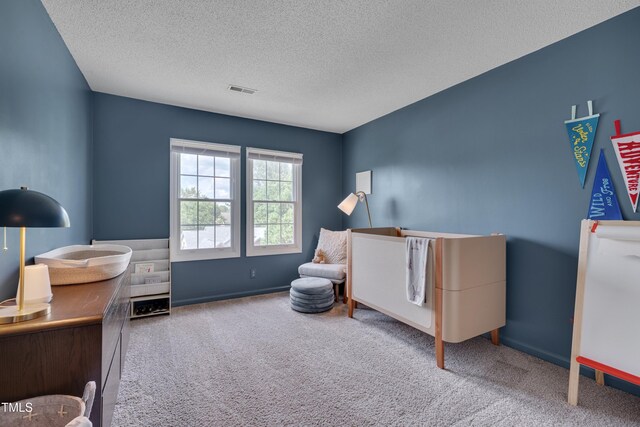 5308 Bentgrass Dr, Raleigh, NC 27610 - living area featuring carpet flooring and a textured ceiling