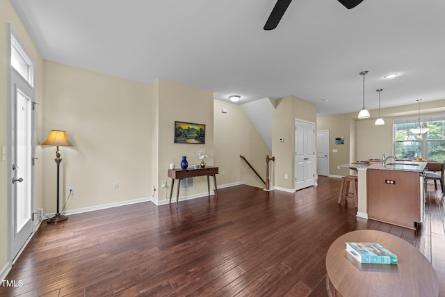 4124 Sykes St, Cary, NC 27519 - living area featuring ceiling fan and dark wood finished floors