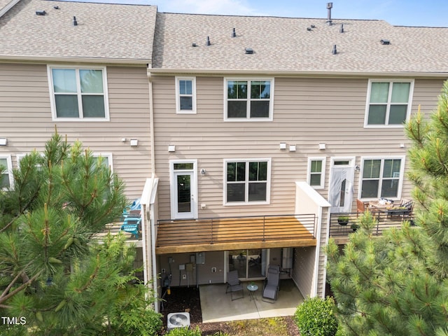 4124 Sykes St, Cary, NC 27519 - back of house featuring a patio and a shingled roof