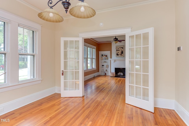 601 E Franklin St, Raleigh, NC 27604 - unfurnished sunroom with french doors and a chandelier