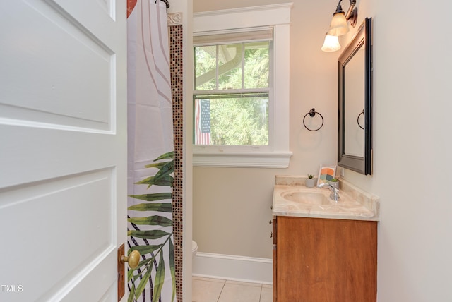 601 E Franklin St, Raleigh, NC 27604 - bathroom with vanity, tile patterned floors, and a shower with shower curtain