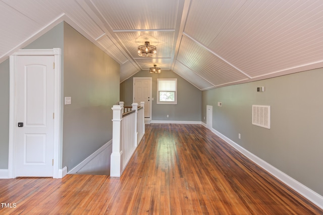 601 E Franklin St, Raleigh, NC 27604 - additional living space with hardwood / wood-style flooring and vaulted ceiling