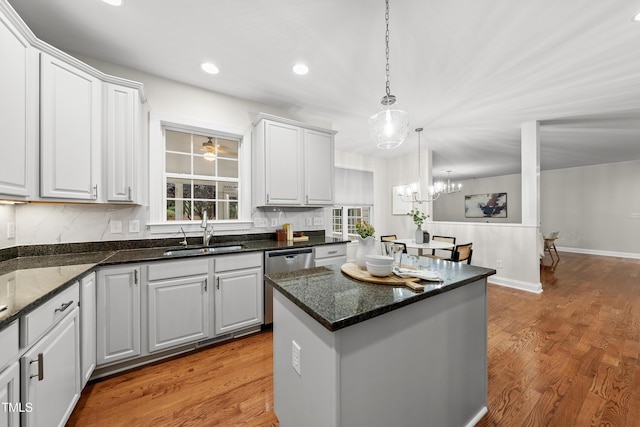 501 Ivyshaw Rd, Cary, NC 27519 - kitchen featuring dishwasher, a chandelier, light wood-style floors, recessed lighting, and a center island