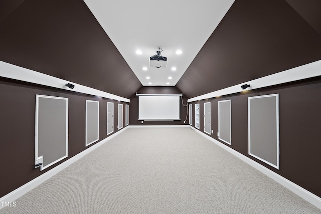 501 Ivyshaw Rd, Cary, NC 27519 - home theater featuring vaulted ceiling, carpet flooring, and recessed lighting