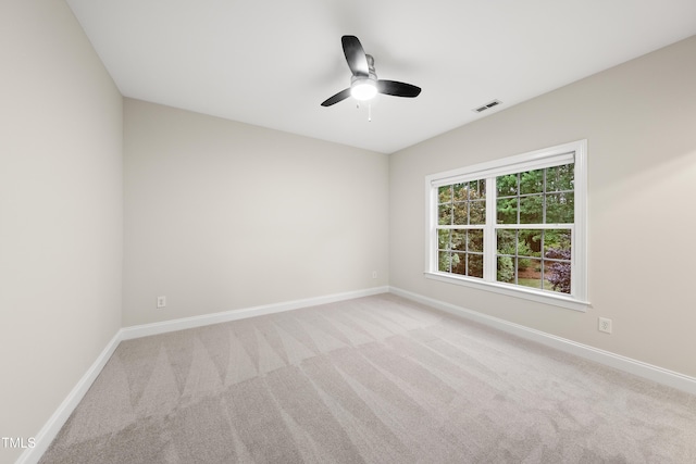 501 Ivyshaw Rd, Cary, NC 27519 - carpeted spare room with baseboards and a ceiling fan