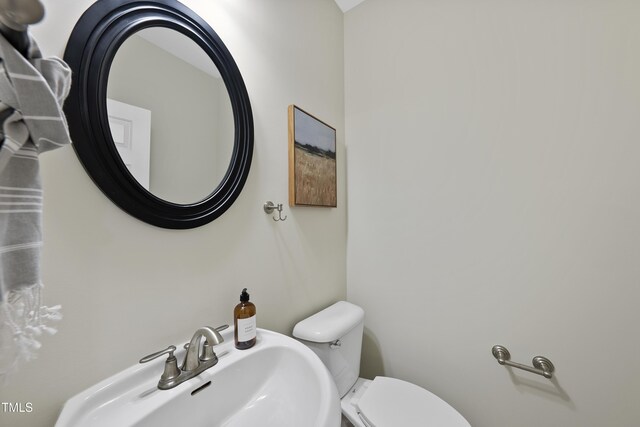 501 Ivyshaw Rd, Cary, NC 27519 - bathroom featuring a sink and toilet