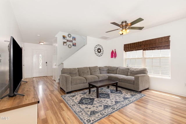 128 Palmdale Ct, Holly Springs, NC 27540 - living room with a ceiling fan and light wood-style floors