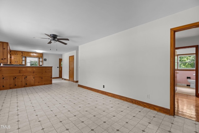 2291 Gentry Ridge Rd, Roxboro, NC 27574 - unfurnished living room with ceiling fan and light floors