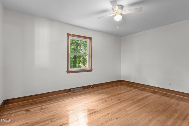 2291 Gentry Ridge Rd, Roxboro, NC 27574 - empty room featuring light wood-style floors and ceiling fan