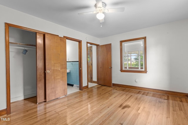 2291 Gentry Ridge Rd, Roxboro, NC 27574 - unfurnished bedroom featuring light wood-type flooring, ensuite bath, a closet, and a ceiling fan