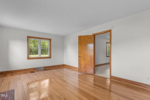 2291 Gentry Ridge Rd, Roxboro, NC 27574 - spare room featuring wood-type flooring and a smoke detector