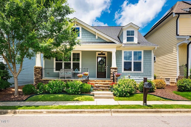 104 Treywood Ln, Chapel Hill, NC 27516 - view of front of property with a porch and a shingled roof