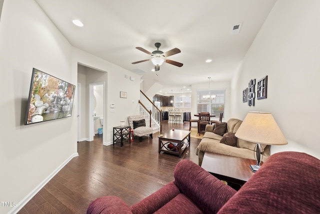 7235 Terregles Dr, Raleigh, NC 27617 - living area featuring a chandelier, stairs, wood finished floors, a ceiling fan, and recessed lighting