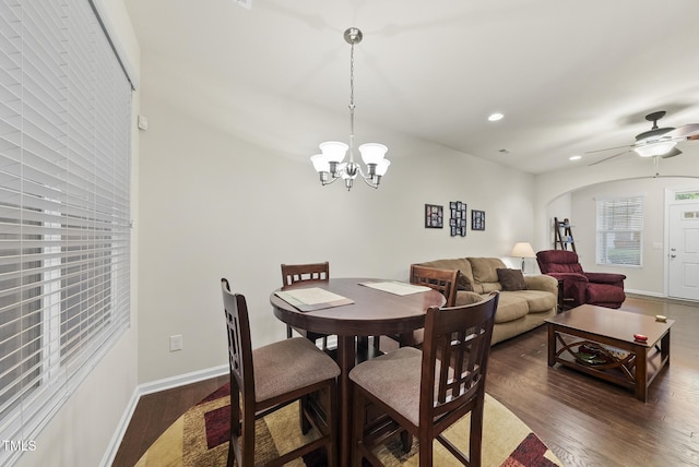 7235 Terregles Dr, Raleigh, NC 27617 - dining space featuring wood finished floors, a chandelier, arched walkways, recessed lighting, and ceiling fan