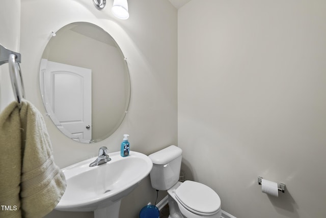 7235 Terregles Dr, Raleigh, NC 27617 - bathroom with toilet and a sink