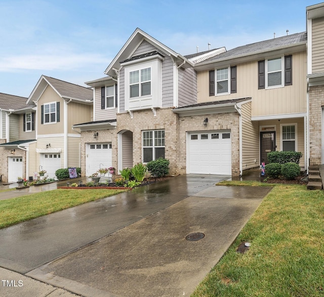 7235 Terregles Dr, Raleigh, NC 27617 - multi unit property with concrete driveway, a garage, a front yard, and brick siding