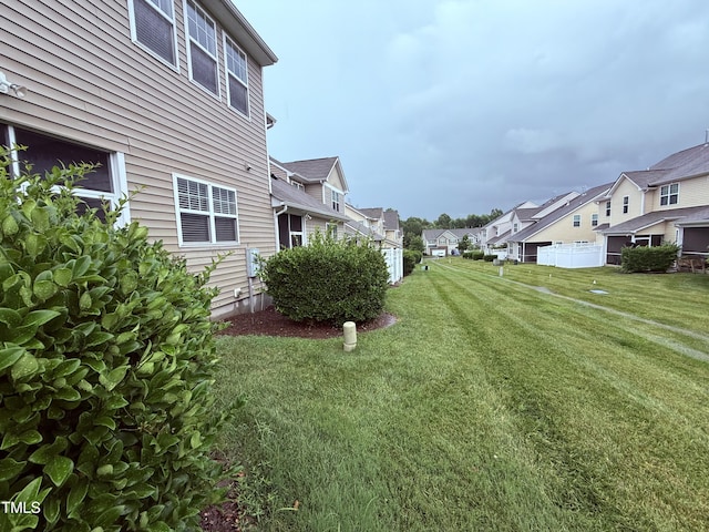7235 Terregles Dr, Raleigh, NC 27617 - view of grassy yard featuring a residential view