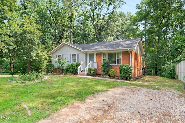 106 Lattimore Ln, Durham, NC 27713 - single story home with brick siding and roof with shingles
