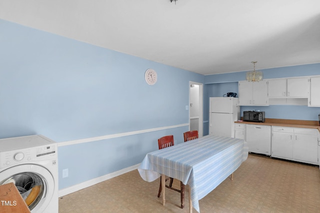 106 Lattimore Ln, Durham, NC 27713 - dining space with washer / dryer and a chandelier