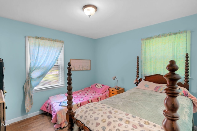 106 Lattimore Ln, Durham, NC 27713 - bedroom featuring wood finished floors and baseboards