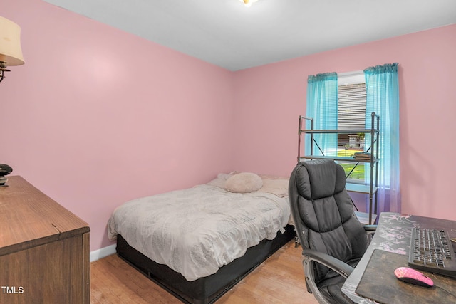 106 Lattimore Ln, Durham, NC 27713 - bedroom featuring light wood-style flooring and an office area