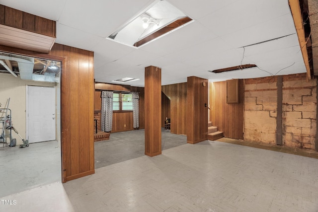106 Lattimore Ln, Durham, NC 27713 - below grade area with stairs, wood walls, and tile patterned floors