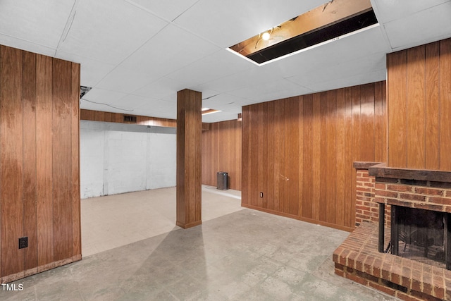 106 Lattimore Ln, Durham, NC 27713 - finished basement with tile patterned floors, a drop ceiling, wood walls, and a fireplace