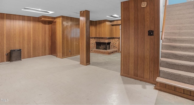 106 Lattimore Ln, Durham, NC 27713 - finished basement featuring wooden walls, stairs, and a fireplace