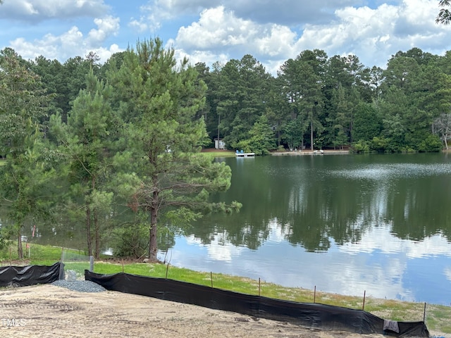 1040 Burning Tree Rd, Pinehurst, NC 28374 - water view with a forest