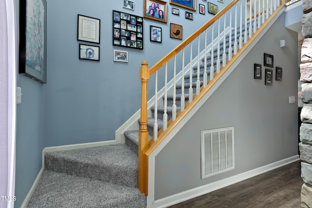 2302 Fordcrest Dr, Apex, NC 27502 - stairs with baseboards and wood finished floors