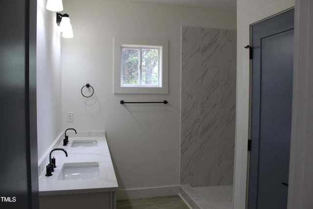 4511 Denfield St, Durham, NC 27704 - full bathroom featuring tiled shower and double vanity