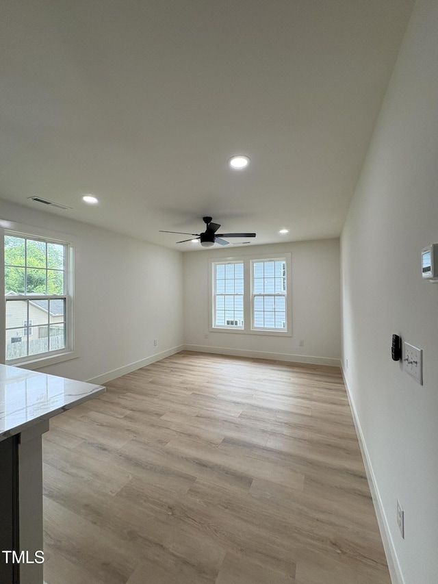 4511 Denfield St, Durham, NC 27704 - unfurnished room with healthy amount of natural light, recessed lighting, light wood-style flooring, and ceiling fan