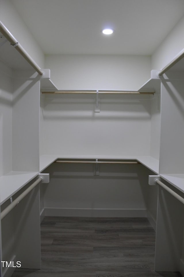 4511 Denfield St, Durham, NC 27704 - spacious closet featuring dark wood finished floors