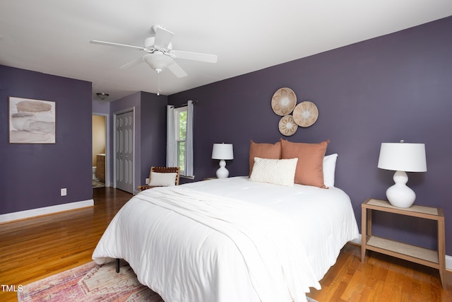 404 Denton St, Durham, NC 27713 - bedroom with wood finished floors, a closet, a ceiling fan, and connected bathroom
