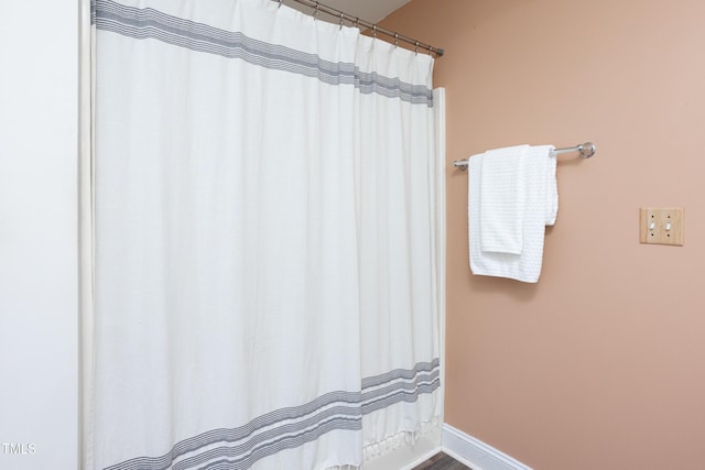 404 Denton St, Durham, NC 27713 - bathroom with a shower with curtain and baseboards