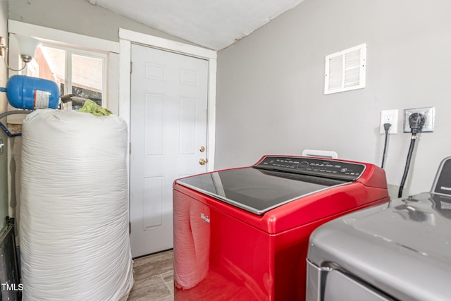 1401 Robinhood Rd, Durham, NC 27701 - laundry room with washing machine and clothes dryer