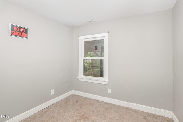 1401 Robinhood Rd, Durham, NC 27701 - carpeted spare room featuring baseboards