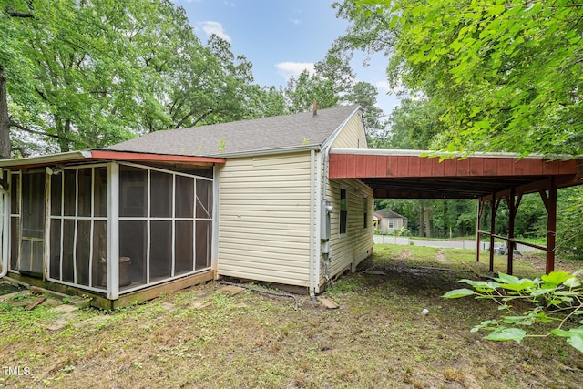 1401 Robinhood Rd, Durham, NC 27701 - view of outdoor structure featuring a sunroom and an attached carport